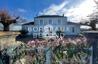 This Maison de Maître has been recently renovated to provide a lovely family home and a comfortable 203m2 of living space with views of the surrounding countryside.